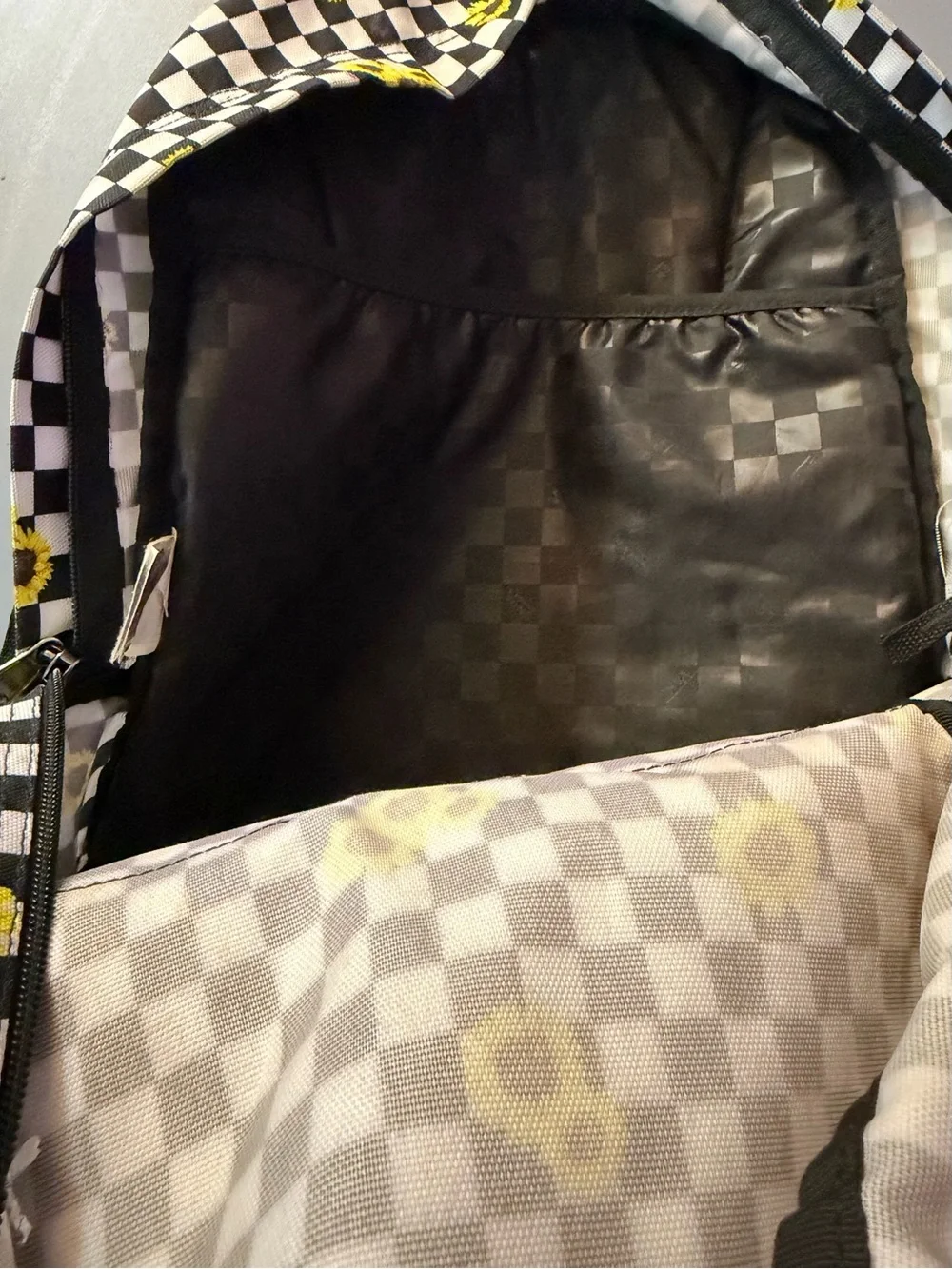 Vans Black & White Checkerboard Backpack with Yellow Sunflowers